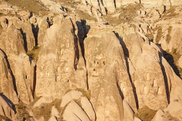 Picturesque rock formatios chimneys in Cappadocia valley. Goreme, Turkey