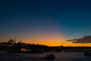 Fototapeta premium Istanbul photo. Suleymaniye Mosque and Golden Horn at sunset from Galata Bridge