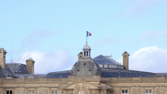 Top of the Luxembourg Palace in Paris, with the flag of France waving, home of the French Senate