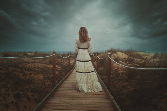 Woman on a wild beach
