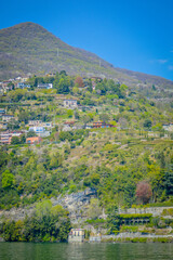Fototapeta na wymiar Spring in Italy, Lombardy, Milano, Como lake and city. Landscape view on hills, park, old town and water, with some interesting details, close up and panoramic.