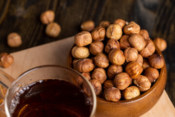 Peeled hazelnuts during cooking, close-up of freshly picked hazelnuts in the kitchen