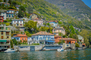 Spring in Italy, Lombardy, Milano, Como lake and city. Landscape view on hills, park, old town and water, with some interesting details, close up and panoramic.