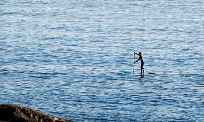 Stand up paddle at the coast of Enoshima, Japan