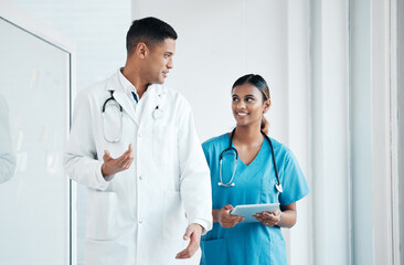 Doctor, nurse and professionals walking, talking and planning healthcare surgery in a hospital...