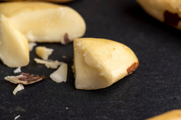 Fresh Brazil nuts peeled from the shell on the table