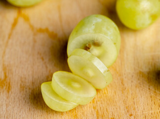 Ripe green grapes on the kitchen table