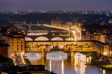 Fototapeta na wymiar Ponte Vecchio bridge over Arno river at sunset, Florence, Italy