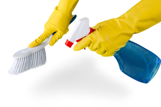 Hands in Rubber Gloves Holding a Brush and Spray Bottle - Isolated
