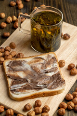 slices of bread with chocolate butter on the table