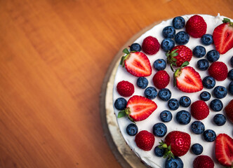 strawberry and blueberry cake on a plate