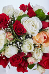 A bouquet of flowers With Green and Yellow and Red...