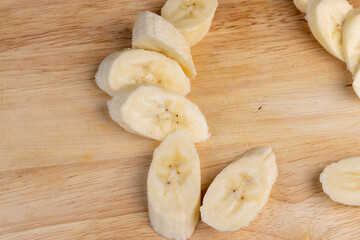 a ripe sweet banana cut into pieces lies on the table