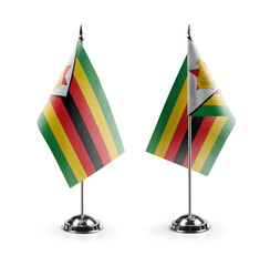 Fototapeta premium Small national flags of the Zimbabwe on a white background
