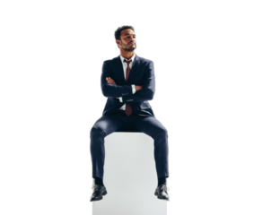 Thoughtful businessman sitting on top of a block on a transparent background