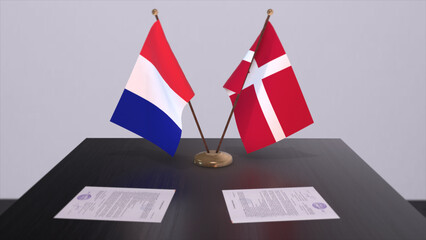 Denmark and France national flags on table in diplomatic conference room. Politics deal agreement 3D illustration