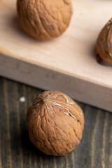 Unpeeled walnut harvest on the table
