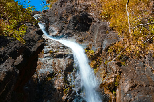 hidden waterfall and rock formation