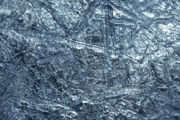 Shiny blue ice surface, macro pattern, natural background texture