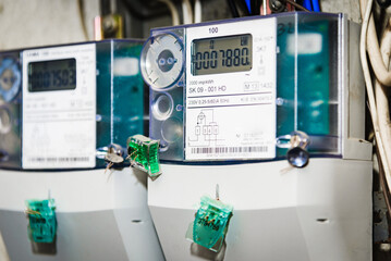 Kilowatt hour electric meters, power supply meters.Close-up of modern smart grid residential...