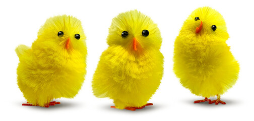 Three cute, funny and flurry yellow Easter decoration chicks isolated, minimum drop shadow