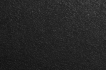 Black embossed surface, artificial leather macro photo texture