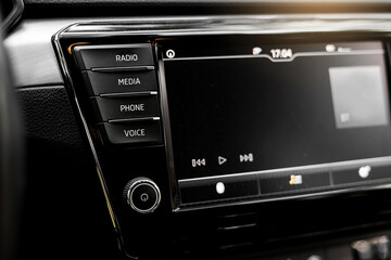 Modern car dashboard. Smart screen multimedia touchscreen system for automobile. Interior details of prestige modern vehicle - obrazy, fototapety, plakaty