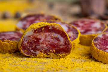 Pork meat sprinkled and dried in ground yellow turmeric