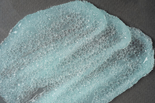 Close-up cosmetic product with bubble texture. Smear of cosmetics for face and body