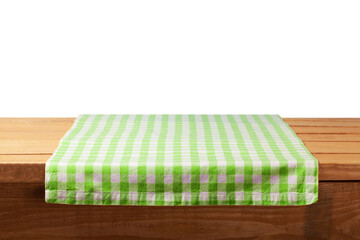 The empty wooden table covered with a color Picnic tablecloth.