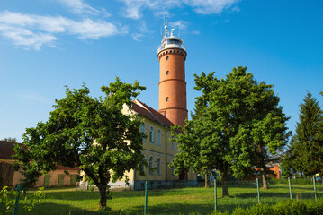 Baltic Sea lighthouse in Jaroslawiec, small coastal village in Poland - 574290856