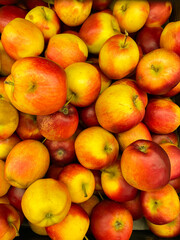 lots of yellow red apple vitamins healthy nutrition delicious food as background