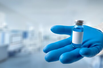 Experimental medical vaccine vial in doctor's hands