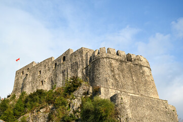 Fototapeta na wymiar Old fortress on the hill. Stone walls. Caste in Herceg Novi, Montenegro.
