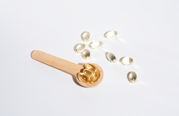 Spoons with vitamins, Vitamin D, omega 3, omega 6, Food supplement oil filled fish oil, vitamin A, vitamin E, flaxseed oil