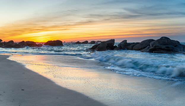 Sunset over the beach at Meneham
