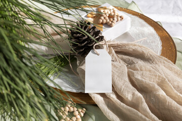Fototapeta na wymiar Christmas tag mockup with pine 