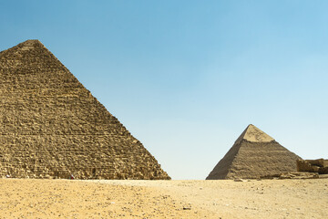 Fototapeta na wymiar Pyramids of Giza. Pyramid of Cheops and Pyramid of Chephren side by side in perspective. Sights in Giza near Cairo in Egypt
