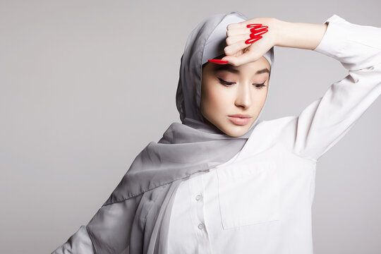 beautiful islamic young woman with long Nails. beauty girl in hijab