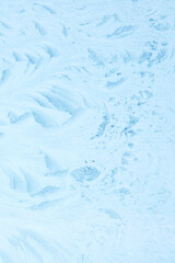Blue frost pattern on glass, background or texture