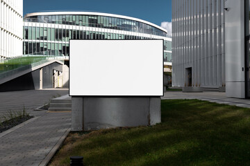Fototapeta na wymiar Light box billboard sign mockup in the urban environment, empty space to display your advertising or branding campaign