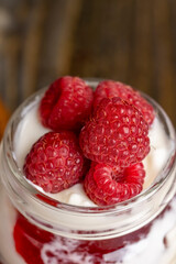 Fresh milk yogurt with whole fresh raspberries