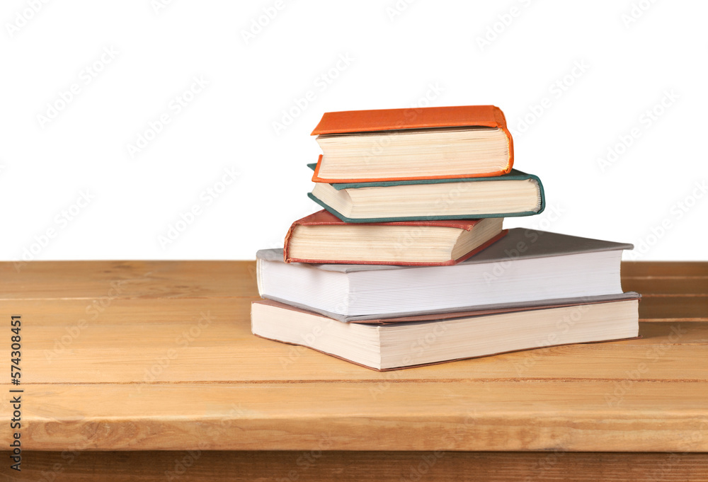 Sticker Stack of old books on the wooden deck table