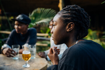 Queer masculine women in a garden