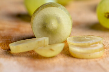 Ripe green grapes on the kitchen table