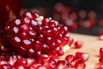 red pomegranate without peel with lots of sweet seeds