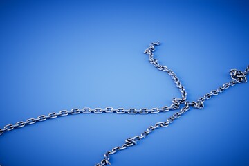 Metal chains isolated on blue background. 3d render