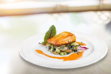 Tasty fresh Dish with fish fillet and salad