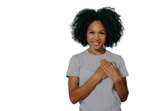 Grateful happy black woman holding hands on chest, satisfied african lady expressing love from heart