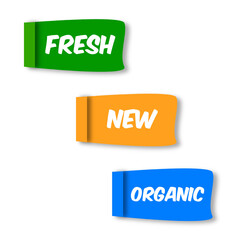 Three small ribbons with inscriptions fresh, new, organic.